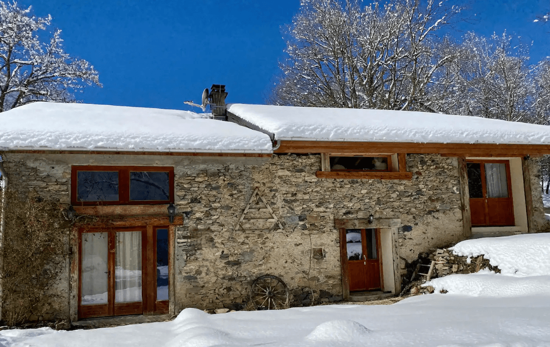Domaine de Pierre a Sel stone chalet in the snow, Savoie